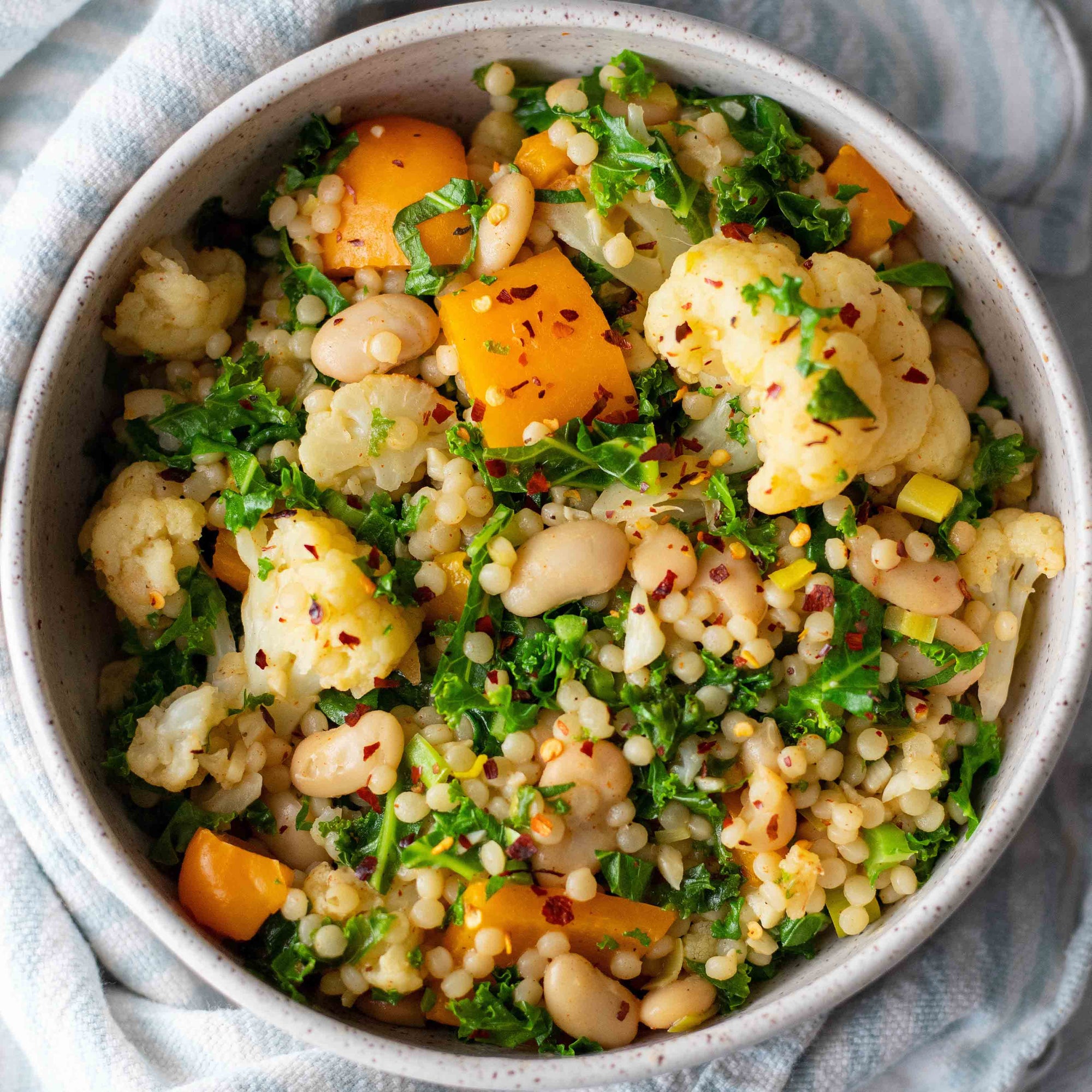 Couscous Bowl with Cannellini, Cauliflower and Kale